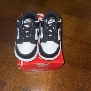 Black and white toddler dunks size 5c